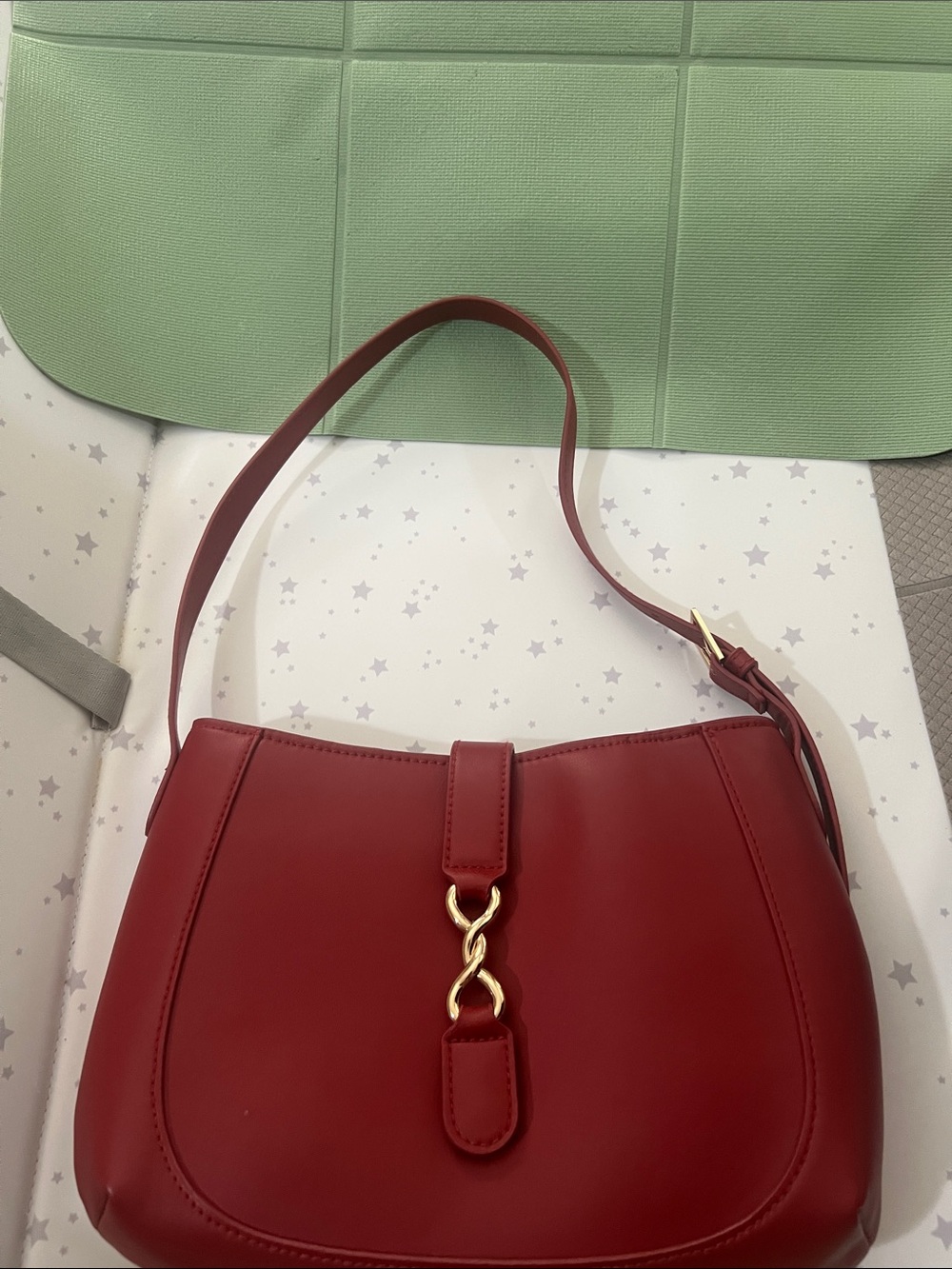 A new day, red shoulder bag